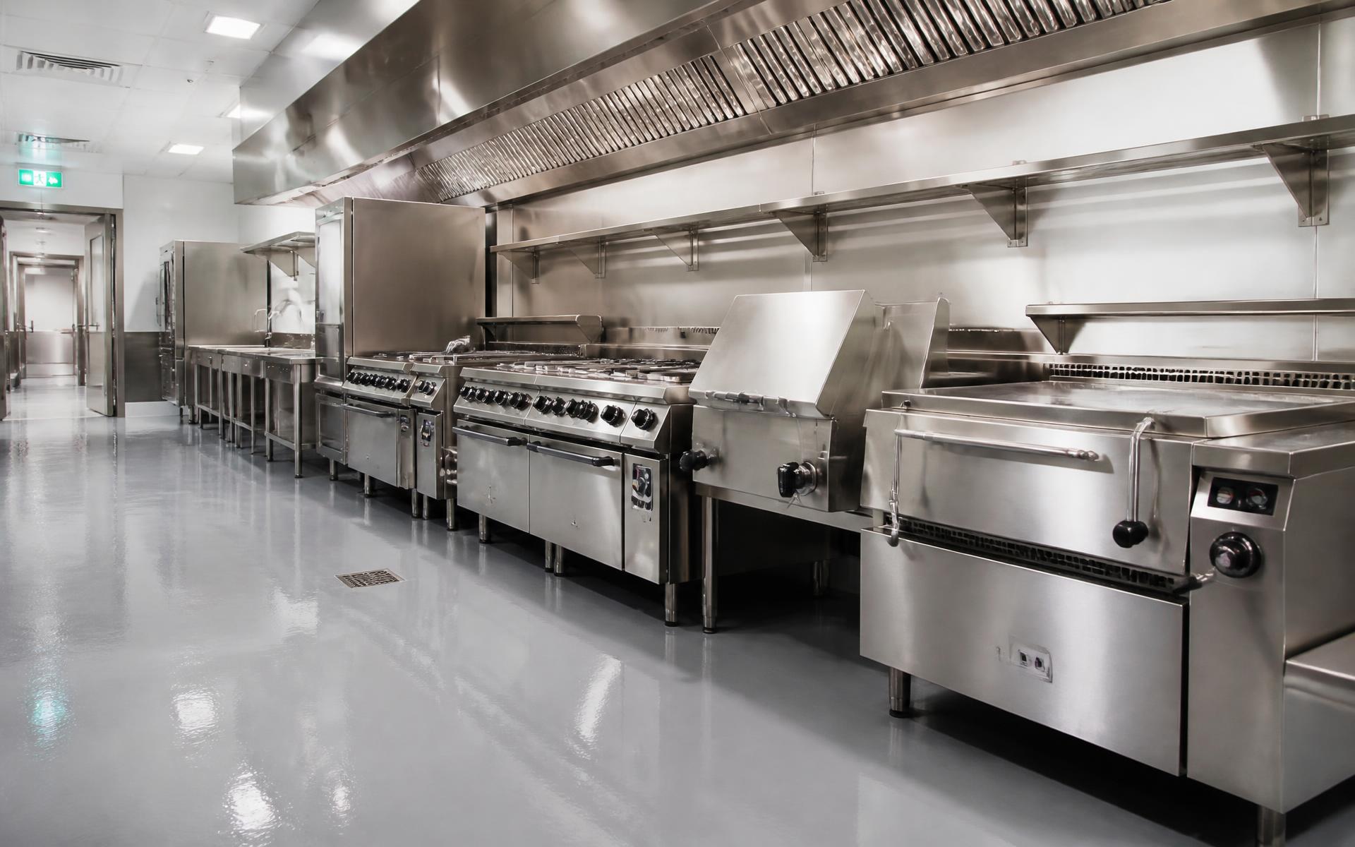 Central kitchen fit-out with stainless steel benches and extraction